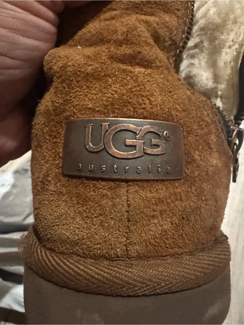 UGG women’s Mayfair Chestnut Suede Zip-Front Boots Metal Logo